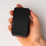Magnetic GPS tracker in hand